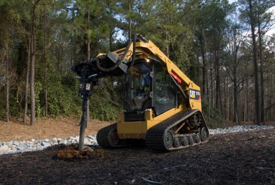 Cat® A26B Auger at Work on a 277D Multi Terrain Loader