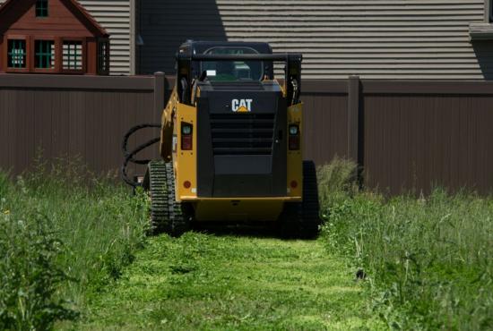 Cat® BR172 Brushcutter in a Landscaping Application