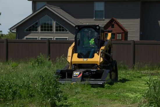Cat® BR172 Brushcutter and 259D Compact Track Loader in a Landscaping Application